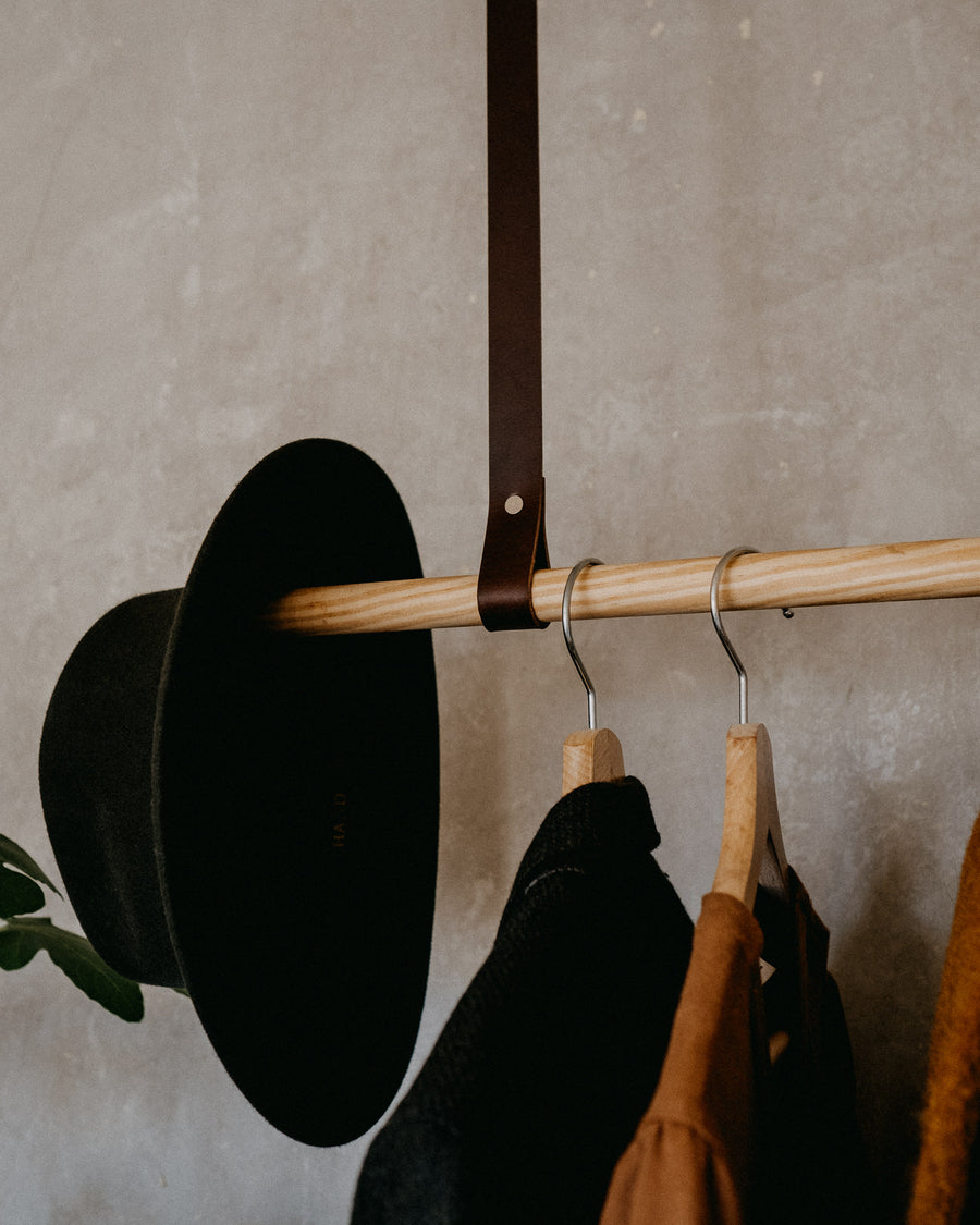 brown leather straps for hanging clothes rail